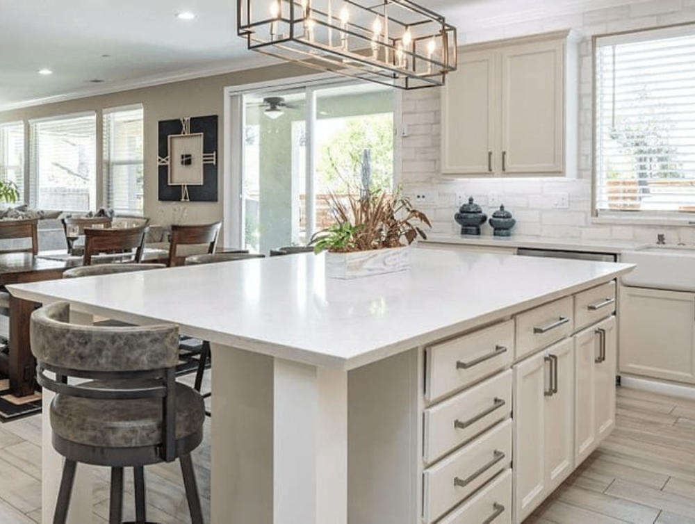 A bright, freshly painted white kitchen.